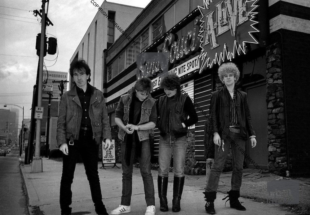 U2 on streets inb Chicago, IL. 1981