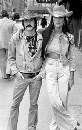 Sonny Bono and Cher standing on Lexington Avenue, NYC. May 5, 1973.
