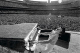 English singer and songwriter Elton John performs at Dodger Stadium in Los Angeles, October 1975.