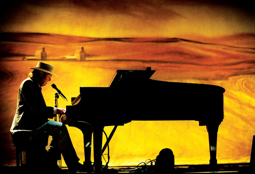 Neil Young performing on stage during the filming of Heart of Gold. At the Ryman auditorium.
Nashville, TN. 2005