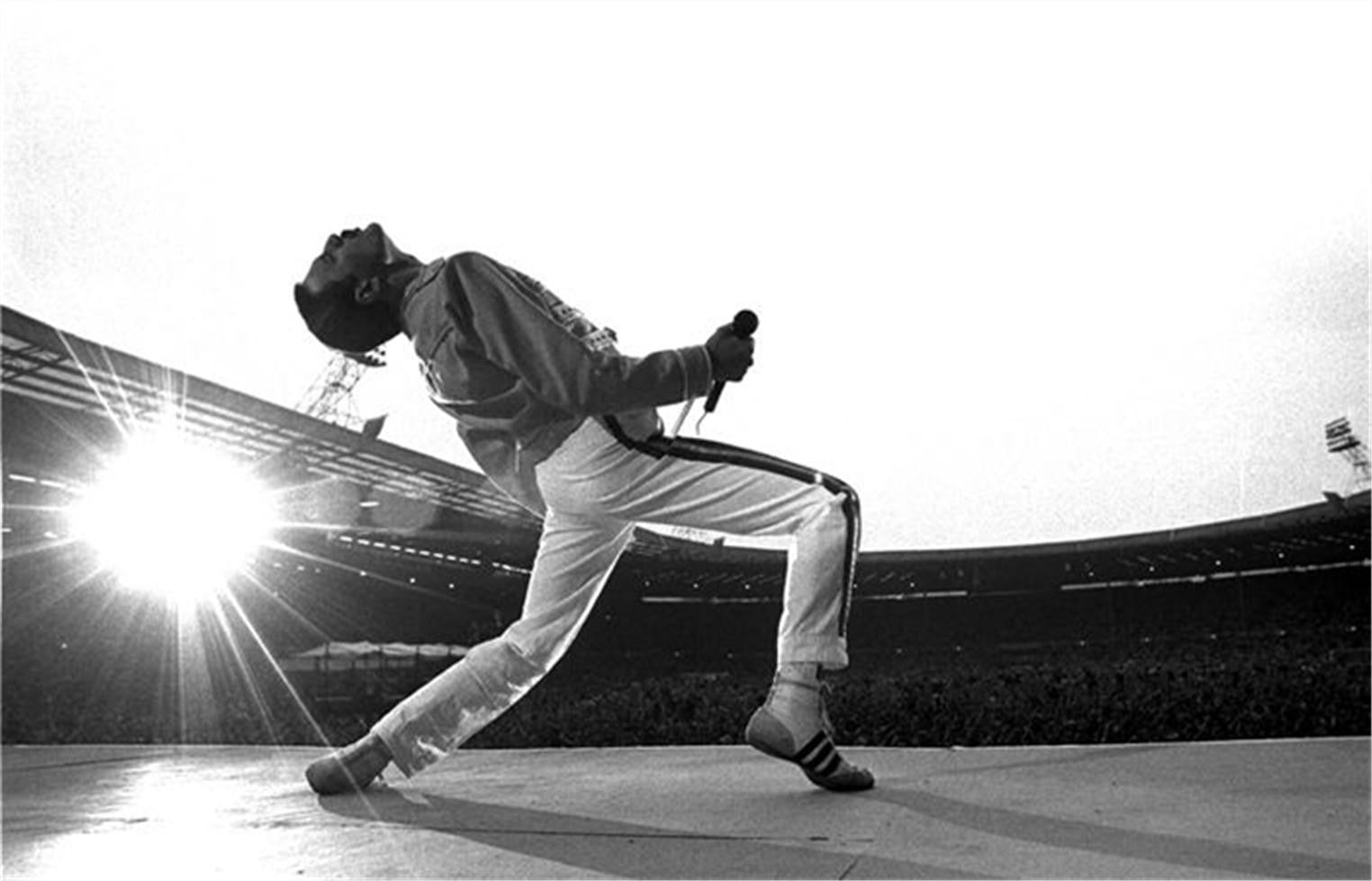 Freddie Mercury on stage at Wembley stadium. London, UK. 1986