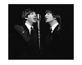 Paul McCartney and John Lennon, performing on The Ed Sullivan Show 1965.