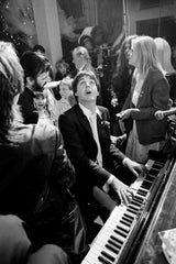 Former Beatle Paul McCartney provides musical entertainment at the wedding reception for ex-Beatles drummer Ringo Starr (left) and Barbara Bach at the London club Rags, 27th April 1981