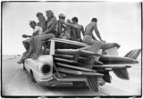 Daytona Beach, FL. 1966. Young kids sitting on station wagon.