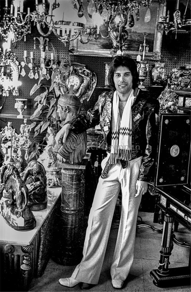 On February 7, 1977, Queen lead singer Freddie Mercury browses an antique store on Second Avenue in Manhattan.