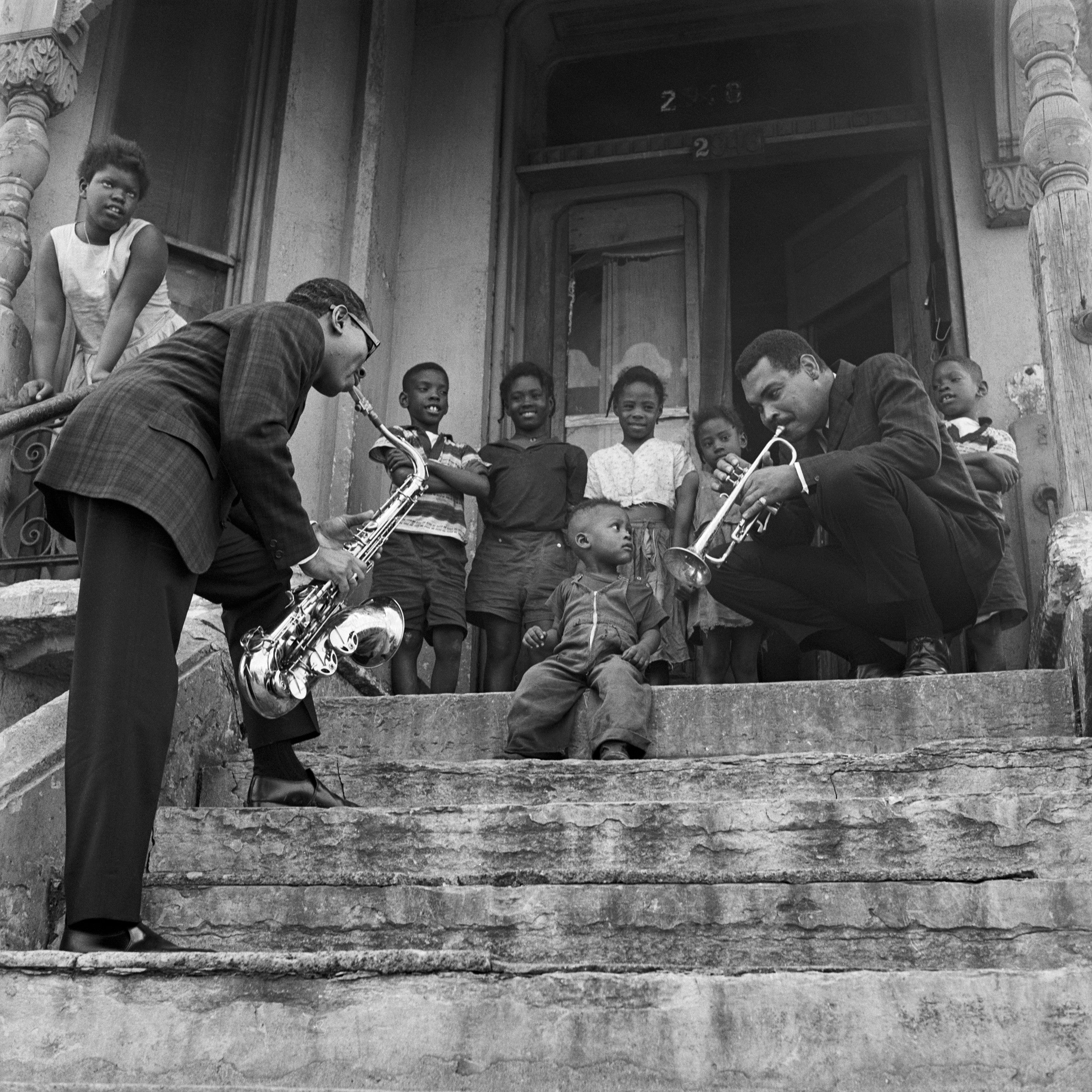 American co-founders of The Jazz, trumpeter Art Farmer and saxophonist Benny Golson visiting an urban renewal project on Chicago’s South Side.