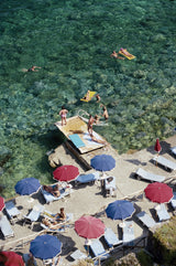 A jetty juts out from a rocky shoreline in Porto Ercole, Tuscany, July 1991.