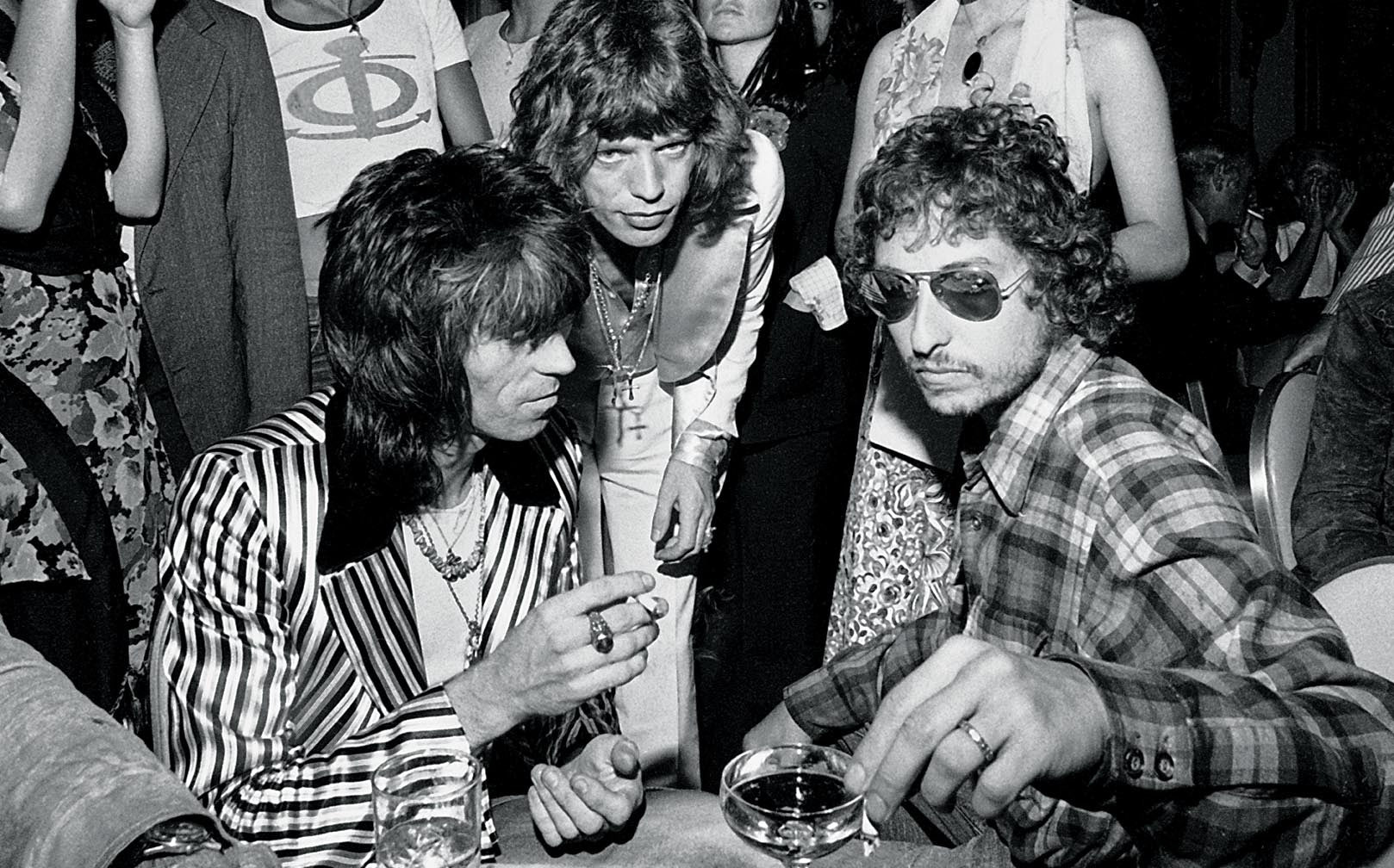 Bob Dylan with Keith Richards and Mick Jagger. Attending Mick Jaggers 29th Birthday party. New York City. 1972