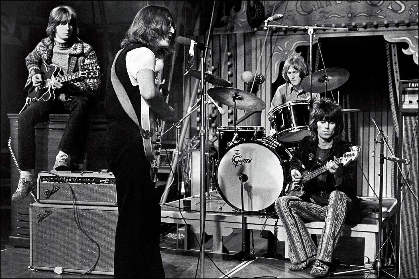 'The Dirty Mac' was a one-time English super-group consisting of John Lennon, Eric Clapton, Keith Richards and Mitch Mitchell that Lennon put together for the Rolling Stones' TV special titled The Rolling Stones Rock and Roll Circus, 1969.