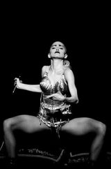Madonna performing on stage during the Blonde Ambition Tour. Tokyo, Japan. 1990