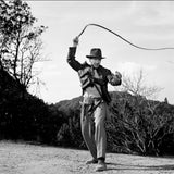 Harrison Ford as Indiana Jones with whip on the film set of ‘Indiana Jones and the Last Crusade’, 1989. Limited edition photograph.