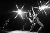 Van Halen performing on stage. 1979