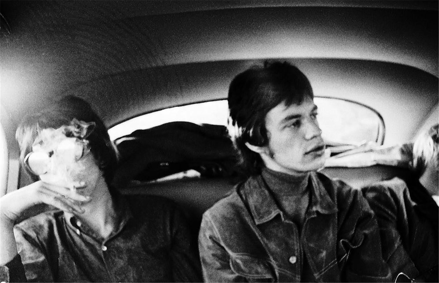 Keith and Mick in the backseat of a limousine in London in 1967.