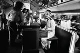 English singer and songwriter Elton John sitting at piano on Starship airplane.