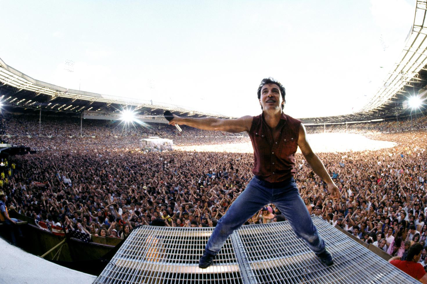 Bruce Springsteen on stage at Wembley, London, UK stadium. 1985