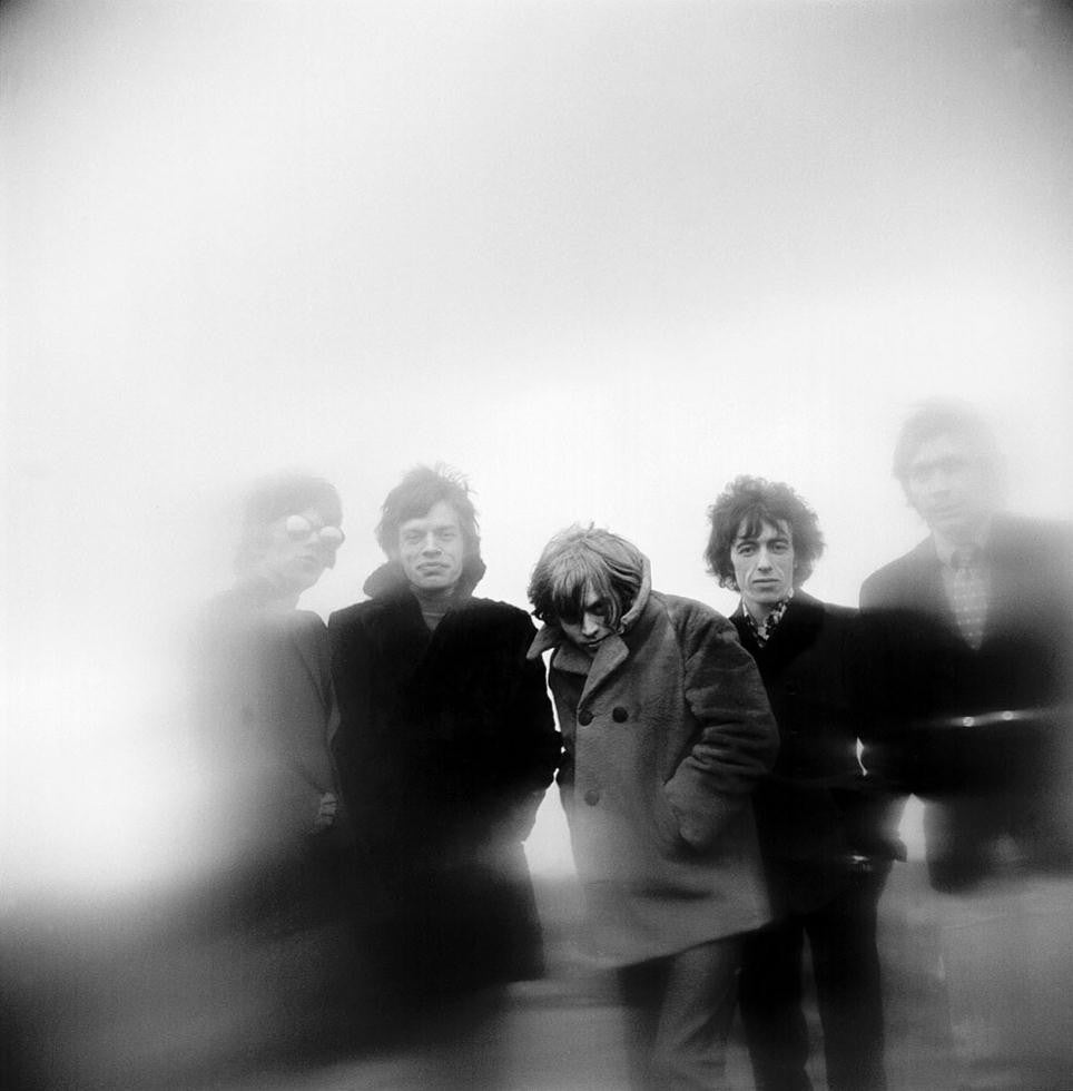The Rolling Stones standing on top of Primrose Hill in the early morning hours.