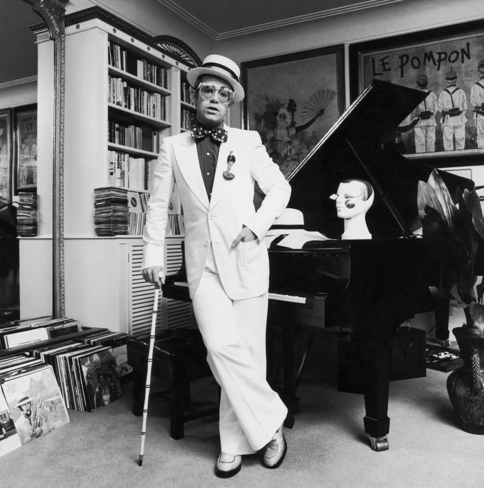 English singer and songwriter Elton John at his home in Wentworth, UK. 1975