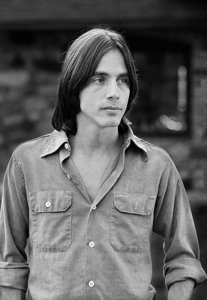 Jackson Browne backstage, Charlevoix, MI during his “Running On Empty” US tour. August 1977.