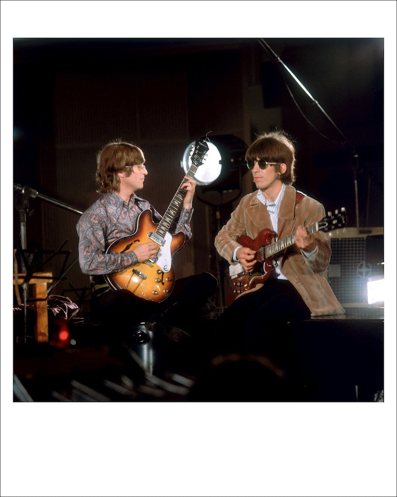 John Lennon and George Harrison in the studio. 1965
