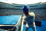 English singer and songwriter Elton John performs at Dodger Stadium in Los Angeles, October 1975.