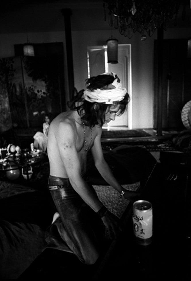 Keith Richards in the living room at Andy Warhols house.
Montauk, NY. 1975