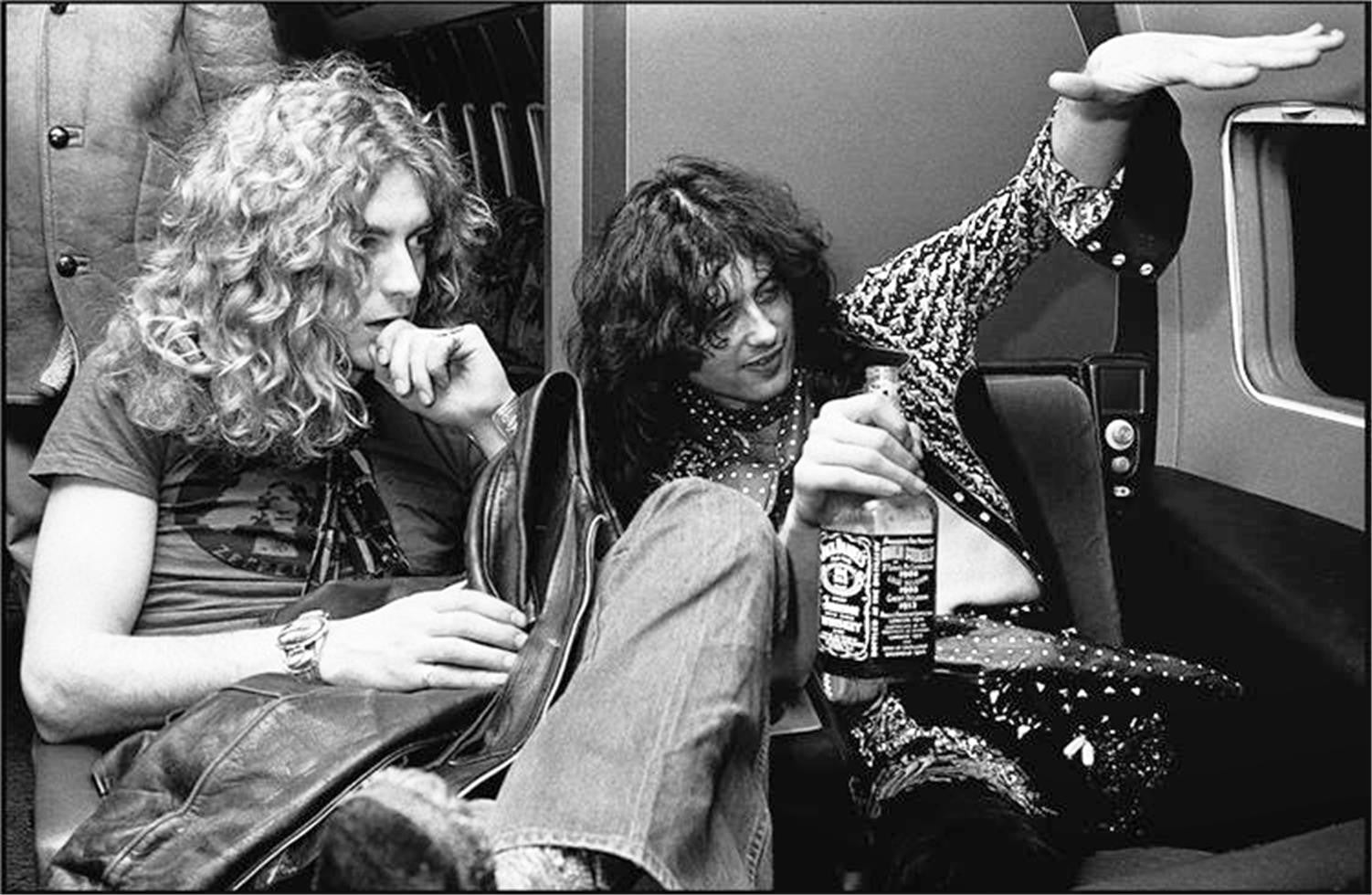 Robert Plant and Jimmy Page in an airplane, 1975. Led Zeppelin