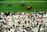 Spectators dine in the open air as the horses go by at Baden-Baden racecourse, Germany, September 1978.