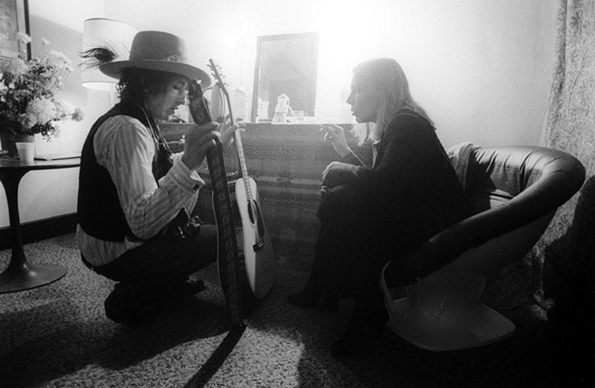 Bob Dylan and Joni Mitchell. Backstage during the Rolling Thunder Review tour.