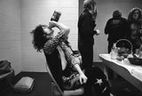 Jimmy Page backstage drinking Jack Daniels. Indianapolis, IN. 1975