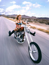 Swedish-American actress, singer and dancer Ann-Margret rides a motorbike, Las Vegas, 1971.
