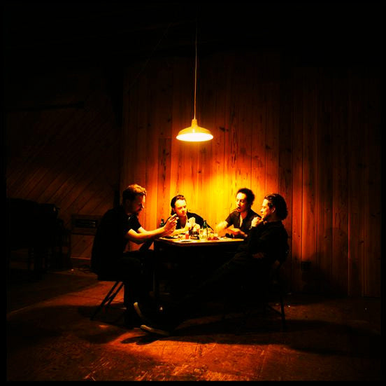 Metallica playing poker.