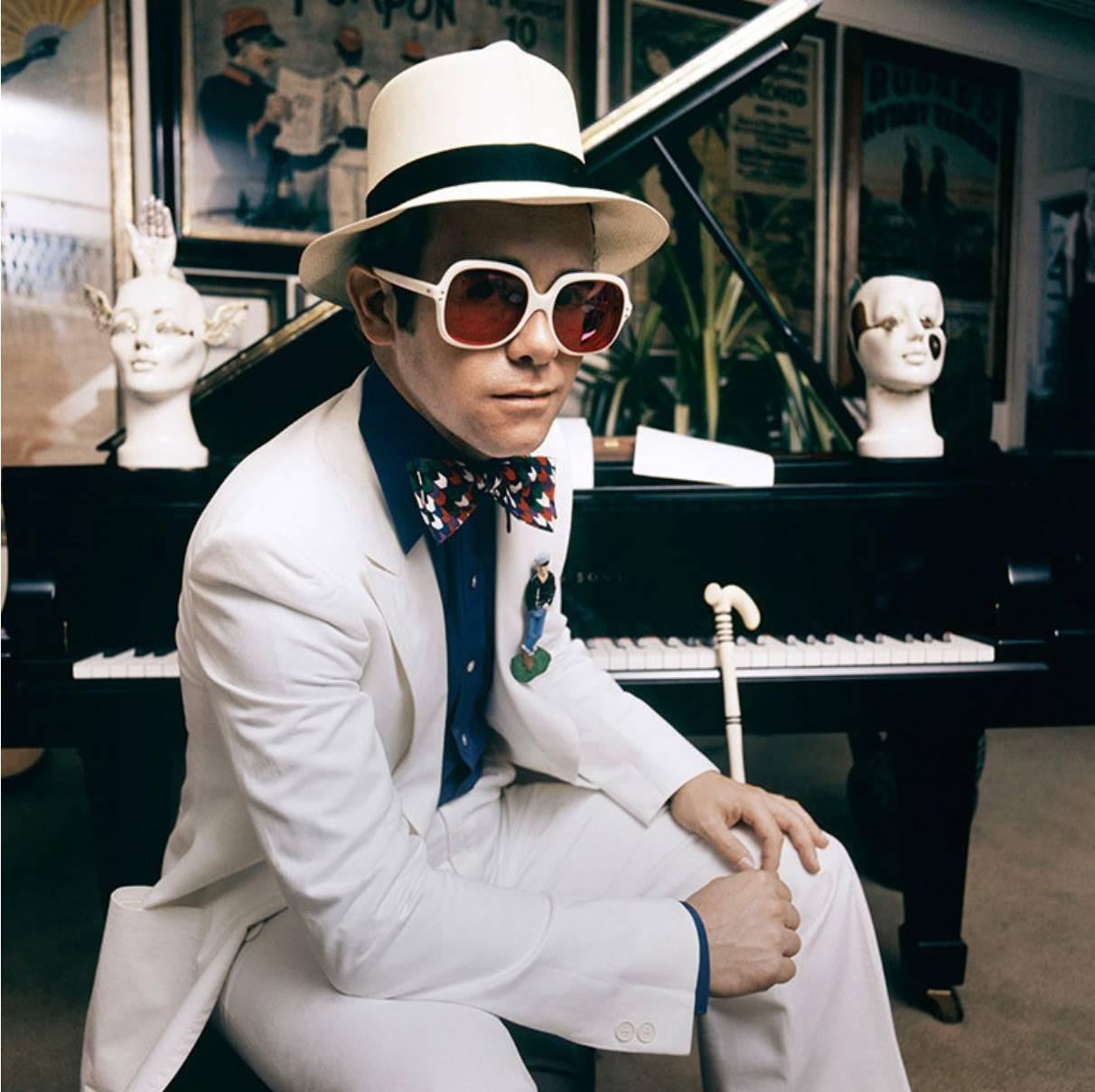 English singer and songwriter Elton John at his home in Wentworth, UK. 1975