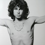 In 1967 at his New York studio, Joel Brodsky's "Young Lion" photoshoot created what have now become the most recognizable portraits of Jim Morrison – capturing the self styled Lizard King at the peak of his physical and artistic powers.