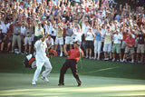 Tiger Woods and caddie Steve Williams react after chipping in on the 16th hole during Round 4 of the 2005 Masters Tournament at Augusta National GC. 2005.