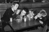 (From left to right) Johnny Rotten, Sid Vicious, Steve Jones and Paul Cook of the Sex Pistols at a cafe in Luxembourg, 1977