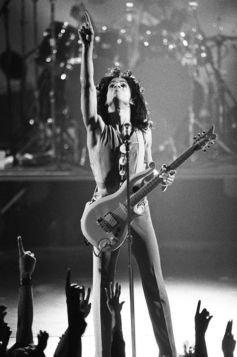 Prince performing on stage.