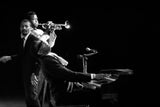 American singer, songwriter, musician and composer Ray Charles on stage performing.