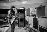 Neil Young listening to his guitar setup during soundcheck, St. Petersburg, FL during his North American tour following the Harvest album.
February 1973