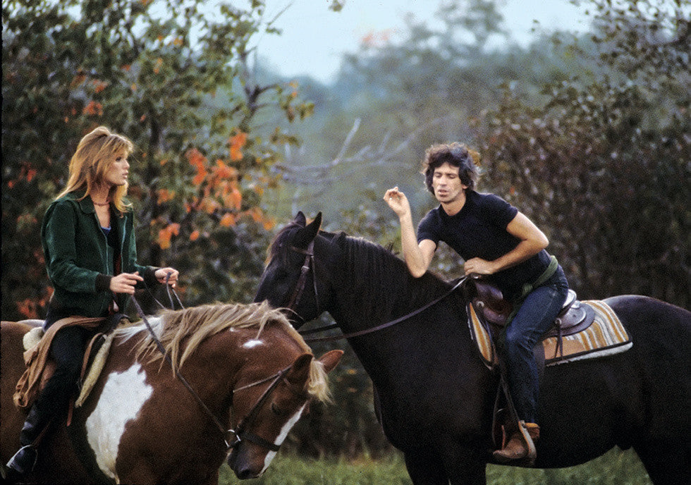 Keith Richards and Patti Hansen on horseback. 1981