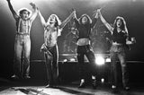 Van Halen performing on stage. 1979