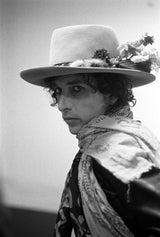 Bob Dylan sitting bacstage during the Rolling Thunder review tour. 1975