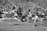 July 22nd, 1962 - USA's Wilma Rudolph in action, crossing the finish line to win the Women's 100m race at Stanford Stadium during a US/USSR track meet.