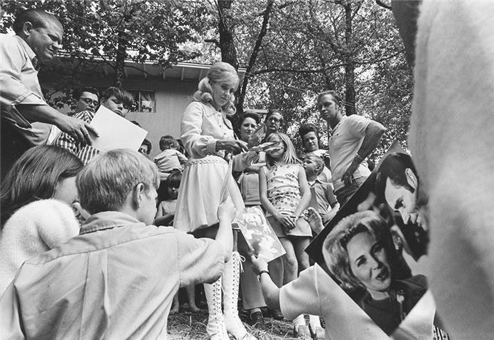Tammy Wynette signing autographs in Lavonia, GA. 1971