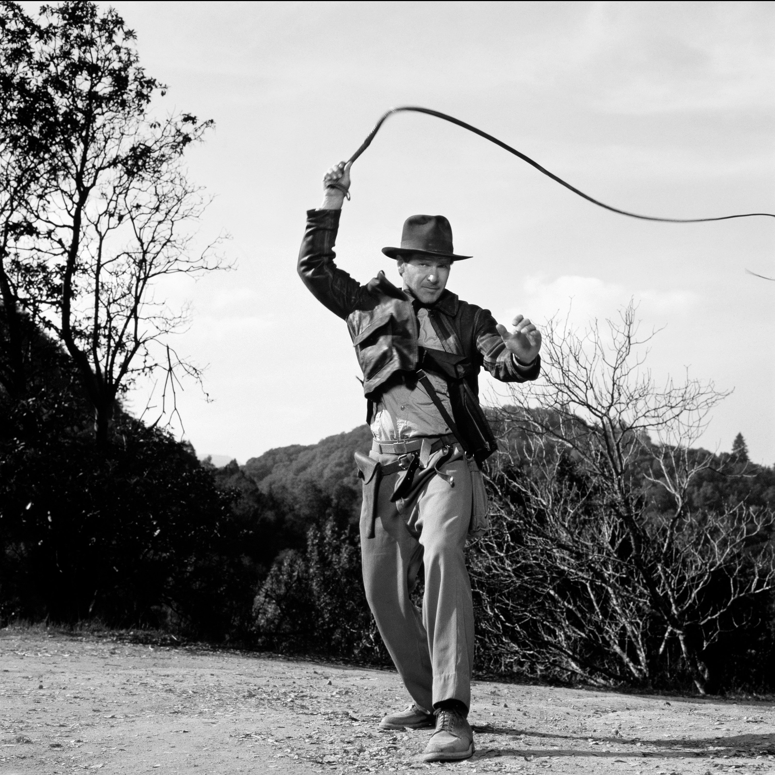 Harrison Ford as Indiana Jones with whip on the film set of ‘Indiana Jones and the Last Crusade’, 1989. Limited edition photograph.
