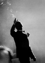 Frank Sinatra waving to the crowd.