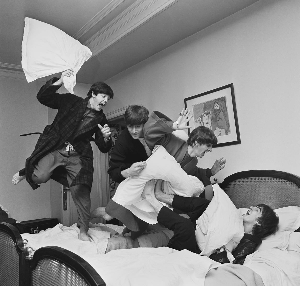 The Beatles having a pillow fight at the George V Hotel in Paris, France. 1964