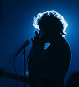 Bob Dylan at the Washington, DC coliseum. 1966. This photograph was used for Bob Dylan "Greatest Hits" Vol. 1.