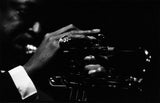 Miles Davis hand on trumpet.
New York. 1953