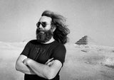 Jerry Garcia standing in front of the Pyramids in Egypt.
1978