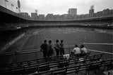 View of fans at Polo Grounds during New York Mets vs Milwaukee Braves game.